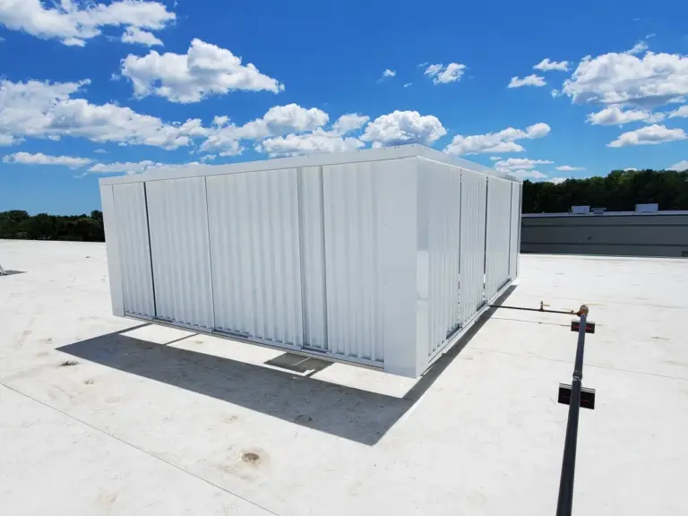 rooftop equipment enclosures on a commercial flat roof